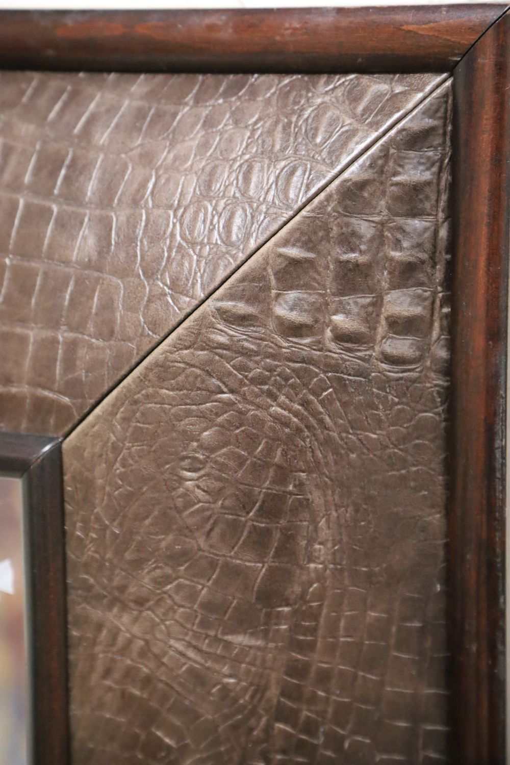 An Andrew Martin faux crocodile rectangular wall mirror, width 116cm height 148cm